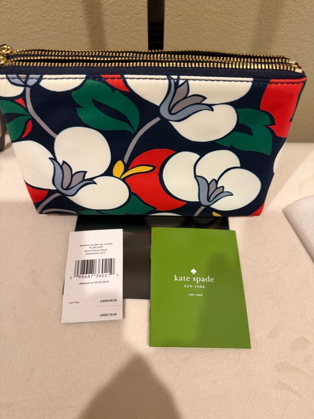 Kate Spade New York Dawn Breezy Floral Medium Double Zip Wristlet. - Picture 6 of 7